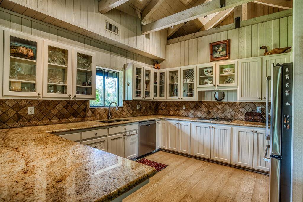 Kitchen opens to dining room