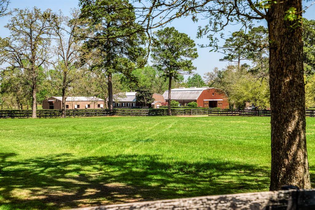 Private entrance to stunning farm. 48+/- acs