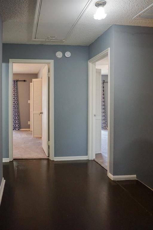 Hall area connecting all 4 bedrooms and full bathroom.