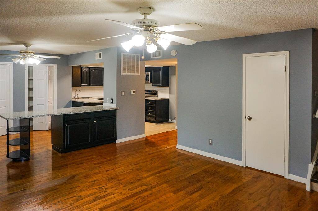 View from the back door entry. Large secondary living room space.