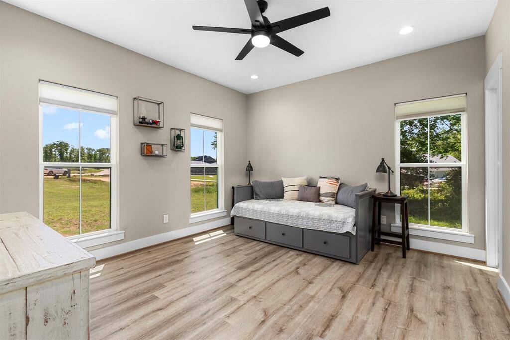 All guest bedrooms have recessed lighting, fan/light combo, walk in closets, and large paned windows.
