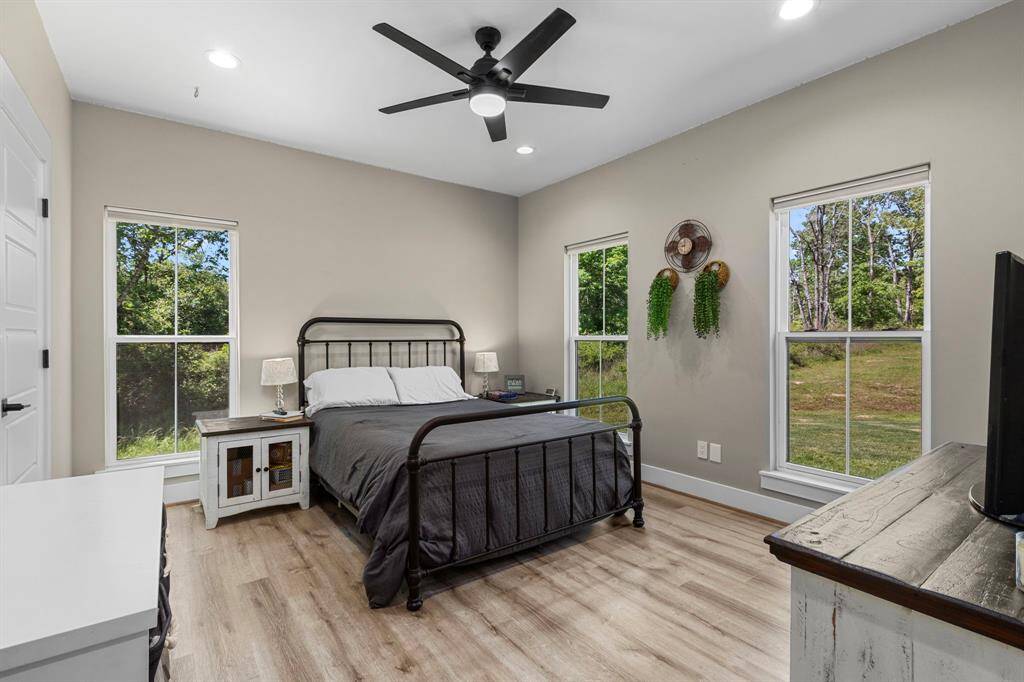 Third guest bedroom downstairs, that has an amazing en suite and walk in closet. Perfect for your in-law space.