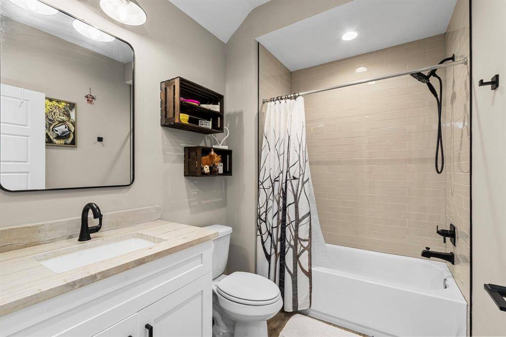The upstairs guest bath. Perfectly sized and secluded.