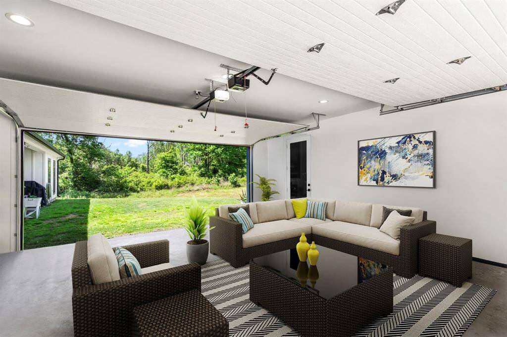 Edited photo of an idea to make this garage a usable outdoor/indoor living space for the backyard. This would be ideal for entertaining.
