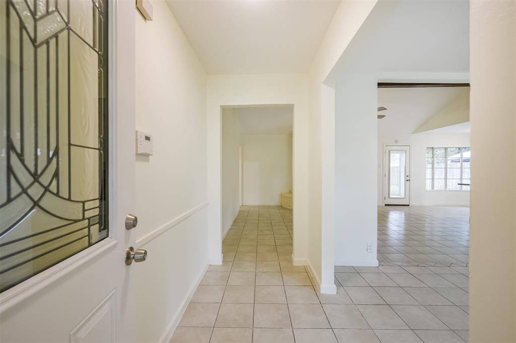 Step into sophistication with this beautifully designed, welcoming entryway.