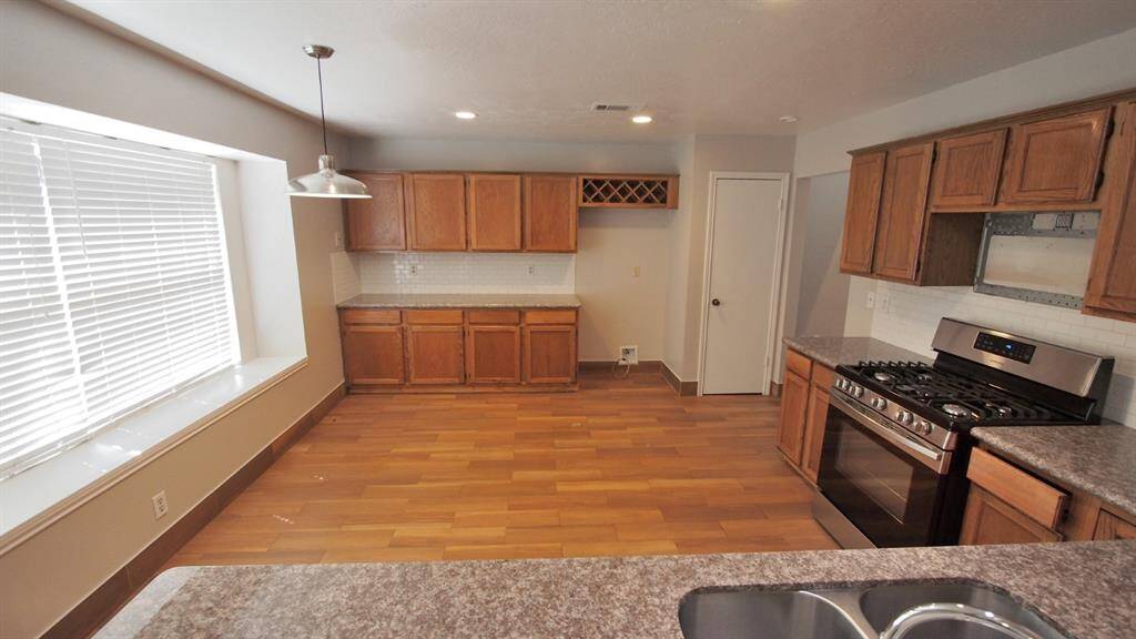View of the Kitchen from the Bar area... from the family room