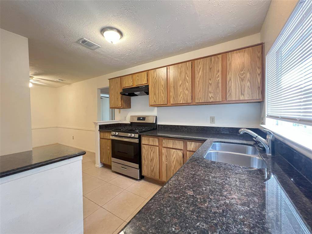 Kitchen with granite countertops