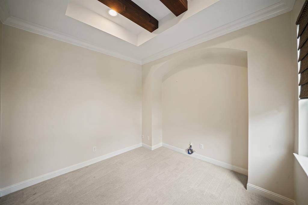Perfect as a sitting area, this space could also easily serve as a private study or home office.