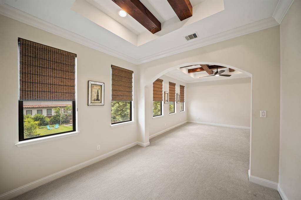 A view of the owner's bedroom from the sitting area.