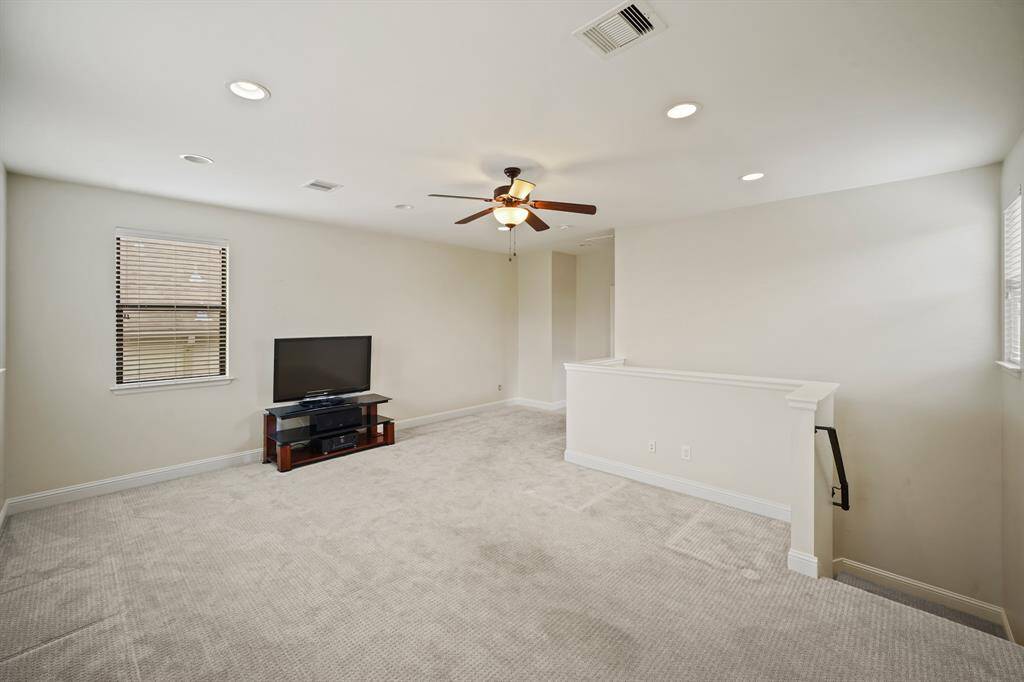 Designed as a game room, this space could serve as a fifth bedroom with a private bath, home office, child's play room, media room, etc.