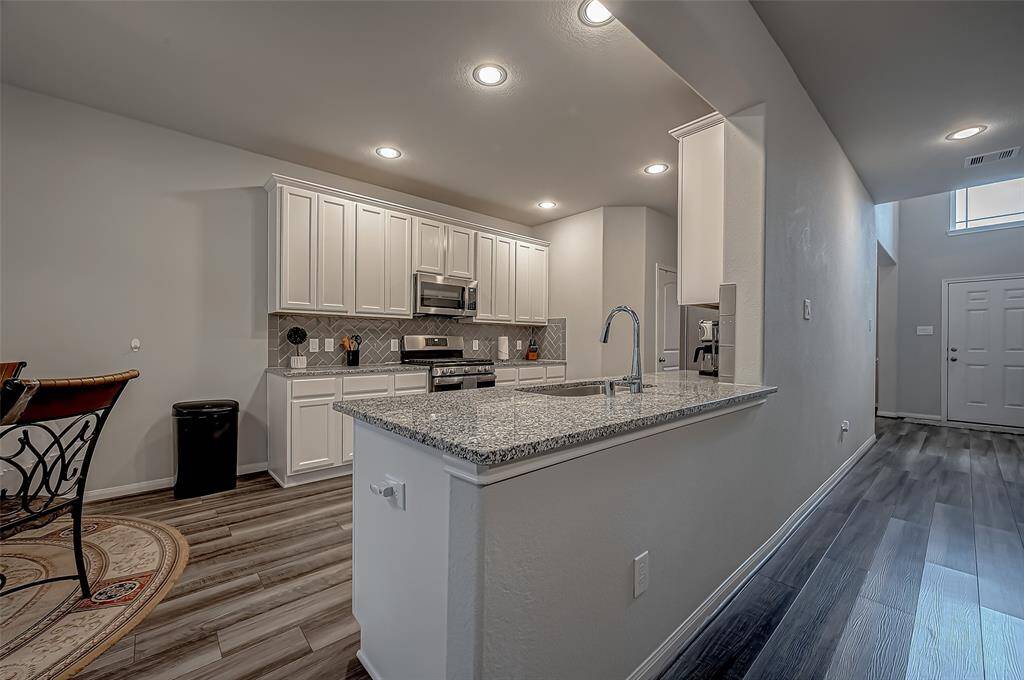 Kitchen is open to the family room - perfect for entertaining.