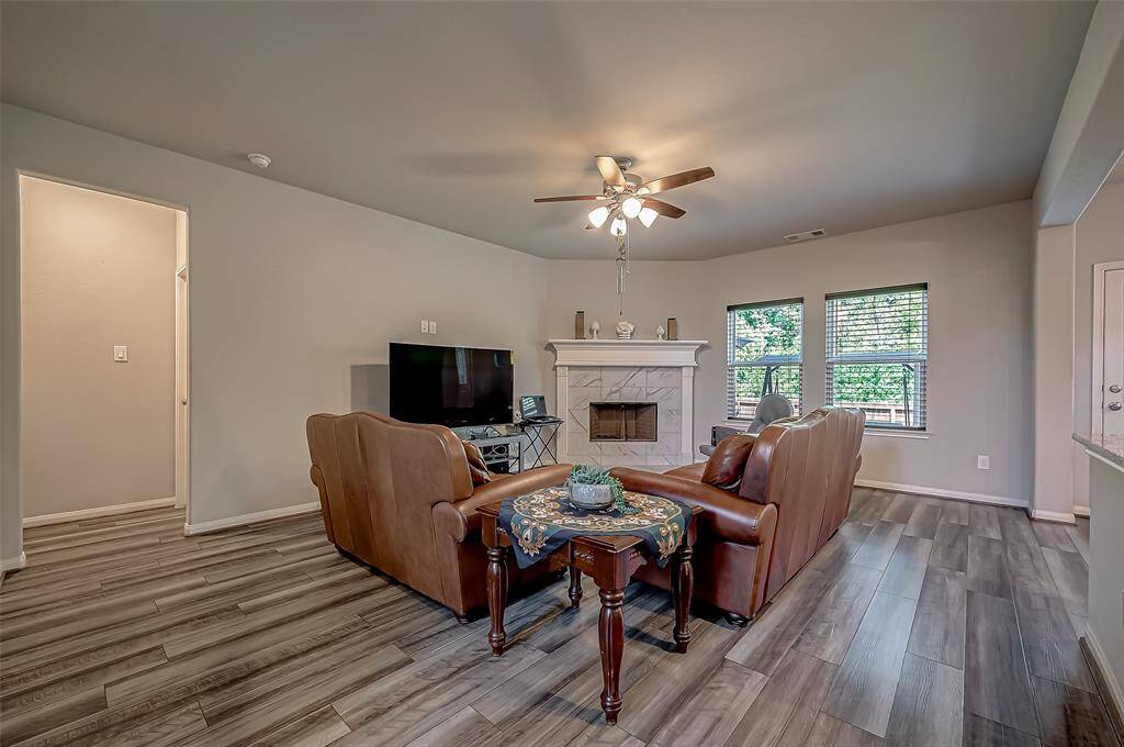 This lovely living room is a great space to gather and visit with your loved ones or enjoy a quiet, peaceful evening at home with your favorite person.