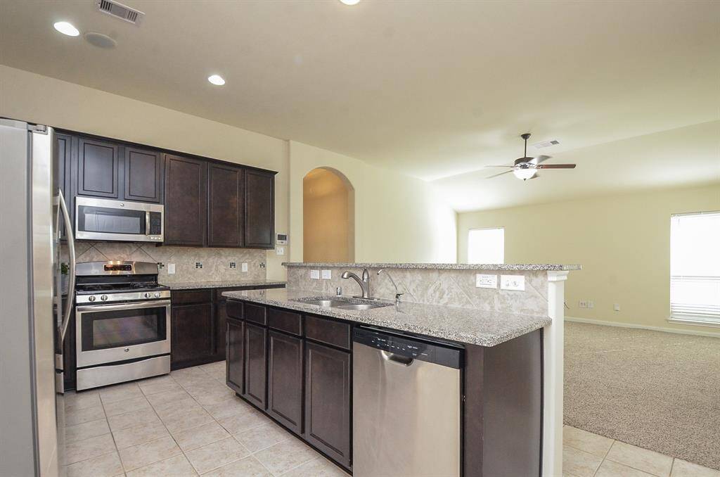 Kitchen looking out towards your living room