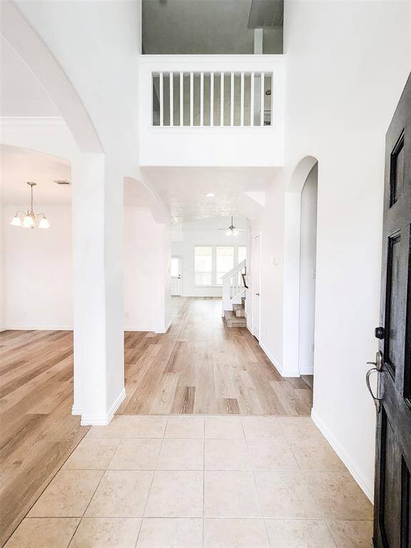 Formal entry with tile foyer