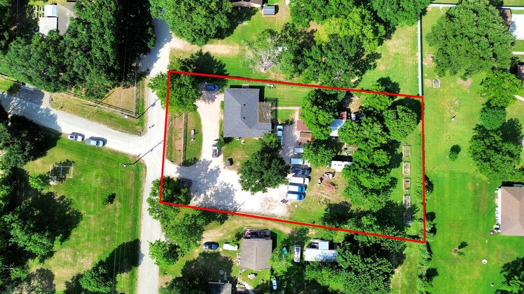 This home features a nice wooded lot with a circle driveway and an extra large parking area. There is also a patio area off the rear of the home and a nice sized workshop.