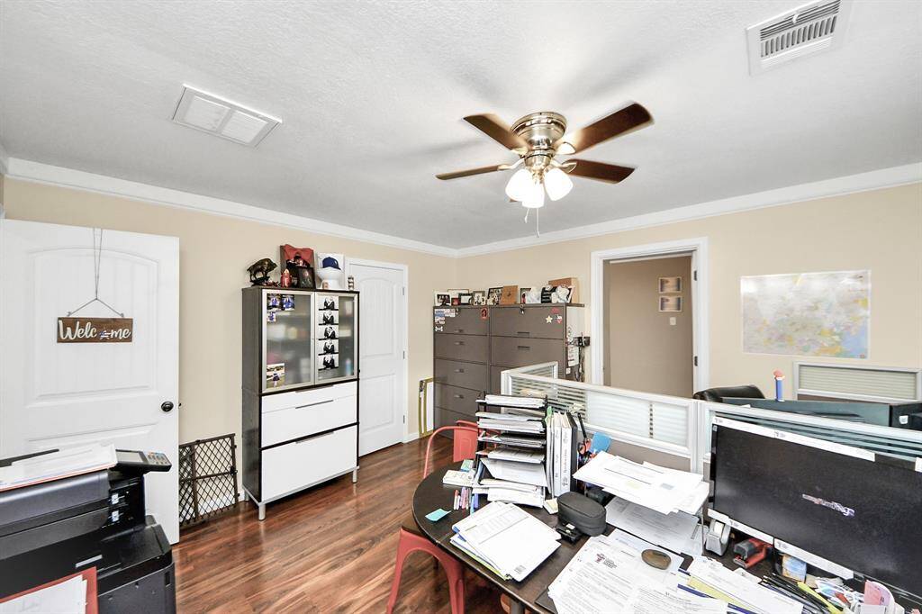 The second bedroom is light and bright with lots of windows.