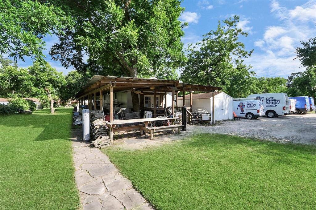 Check out the size of the primary bath.  It features dual sink, soaking tub and a large shower.  The door leads to the back yard, so you don't need to go through the entire home to get to the bathroom. It's a perfect set up for a pool.