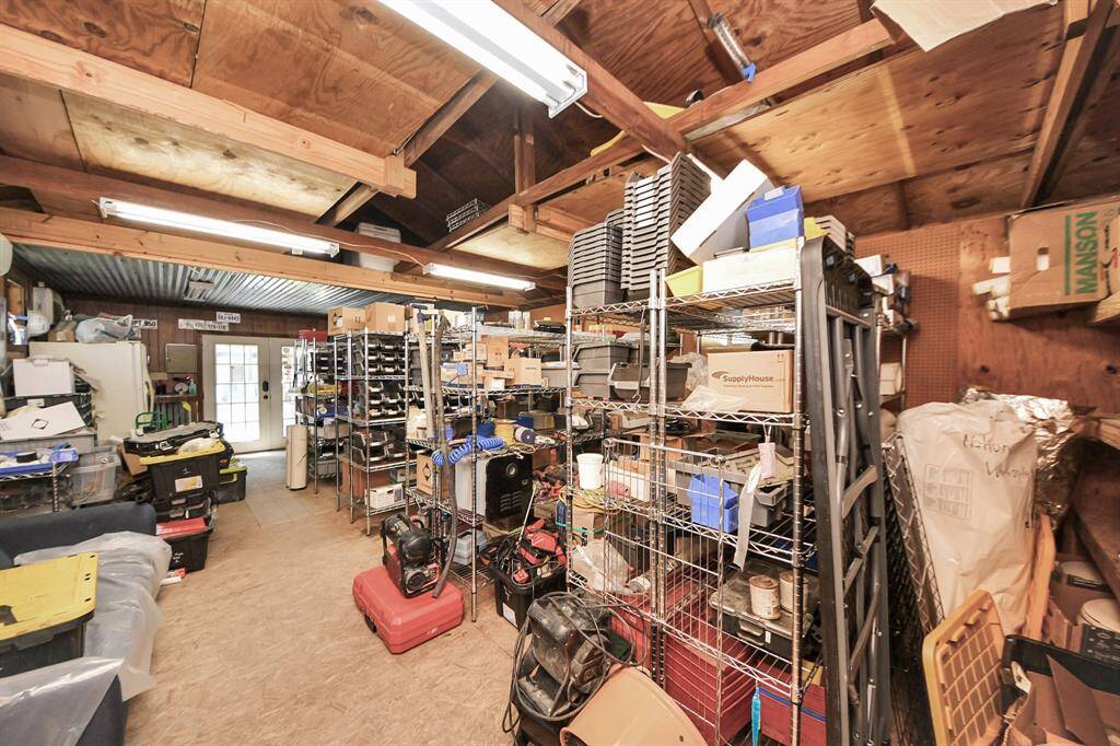 The home sits on an acre and has a storage shed that is air conditioned so it could be used as a man cave, she shed or just for extra entertaining.  There is also an additional storage shed and plenty of space for parking.