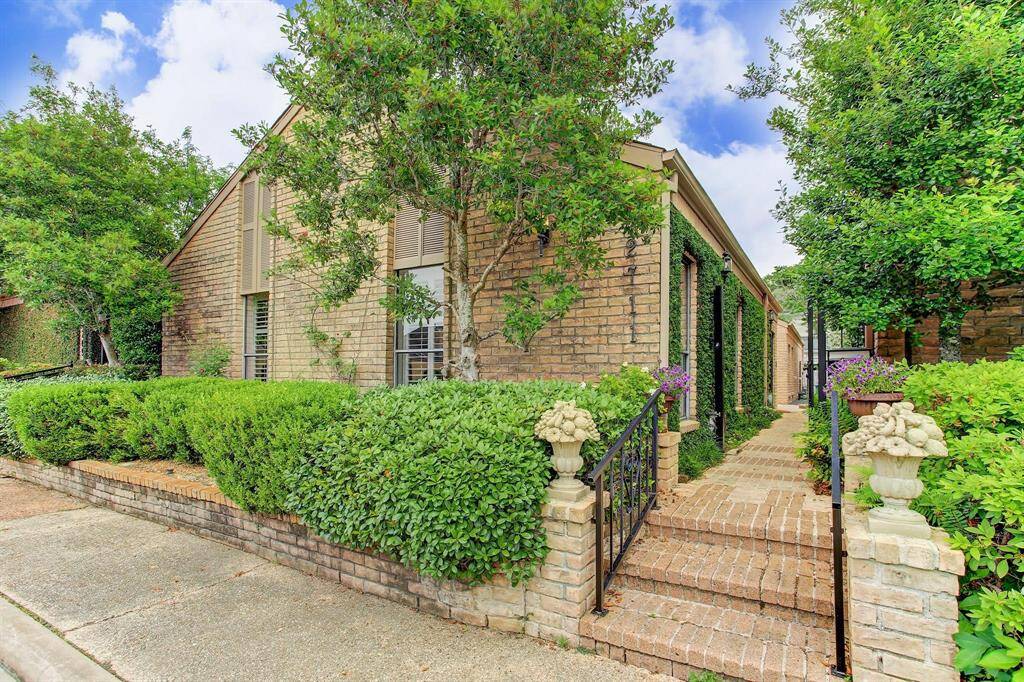 Beautifully updated one-story patio home in ideal River Oaks area location, just steps from Central Market and Highland Village.