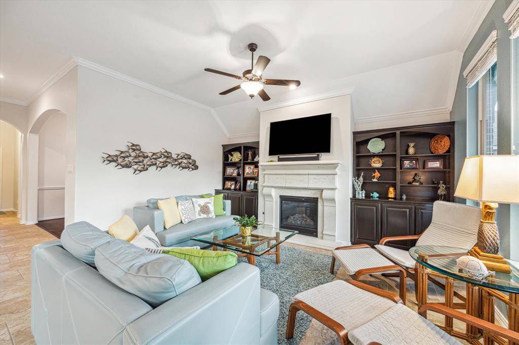 Built ins on both sides of fireplace with storage below