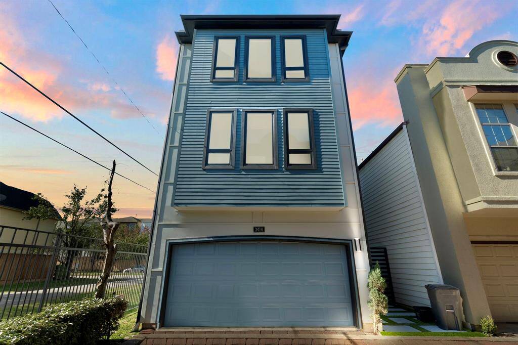 The front of this gorgeous home boasts a completely updated exterior with brand-new stucco and James Hardie siding, backed by a 30-year warranty.