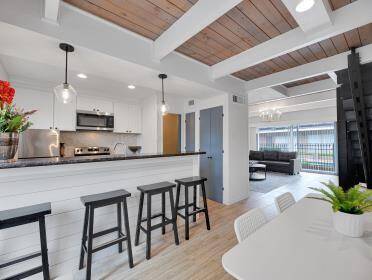 Open concept floorplan with breakfast bar.