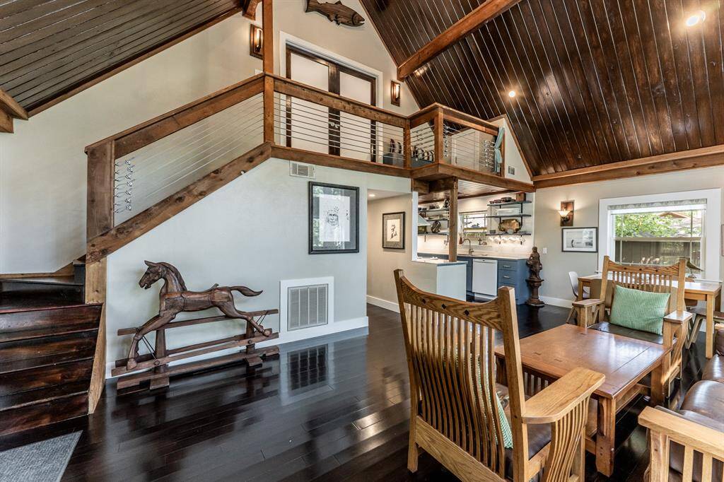 Single panel frosted glass double doors upstairs allow privacy to the upstairs rooms and notice the popped out nook at the end of the upstairs.  This area has a custom installed bench which would be perfect for a reading nook.