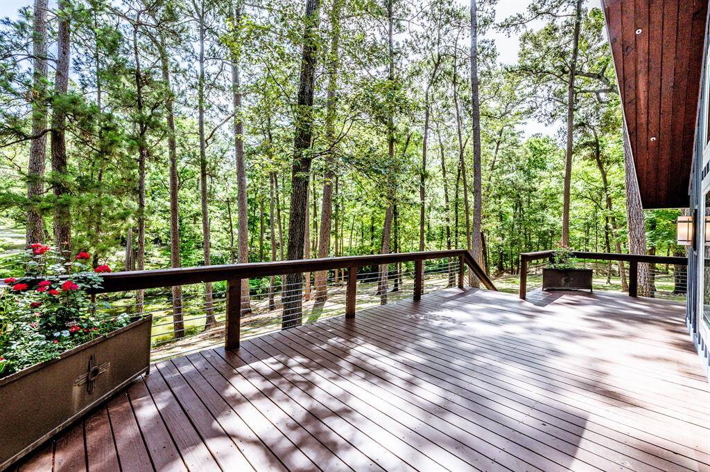 Deck features 3 custom crafted metal corner planters.  Also plenty of room for your grill and outdoor table when you want to host an amazing outdoor get together with family or friends.