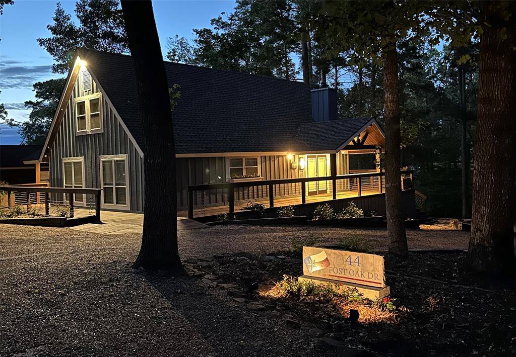 This home is also spectacular at night time.  The address sign is lit at night, and the exterior lights, including the Powerall LED Flood light on the front really light up the night.