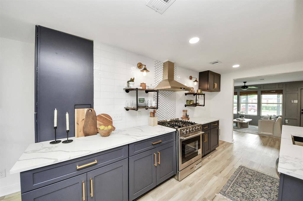 The kitchen also has stainless steel appliances.