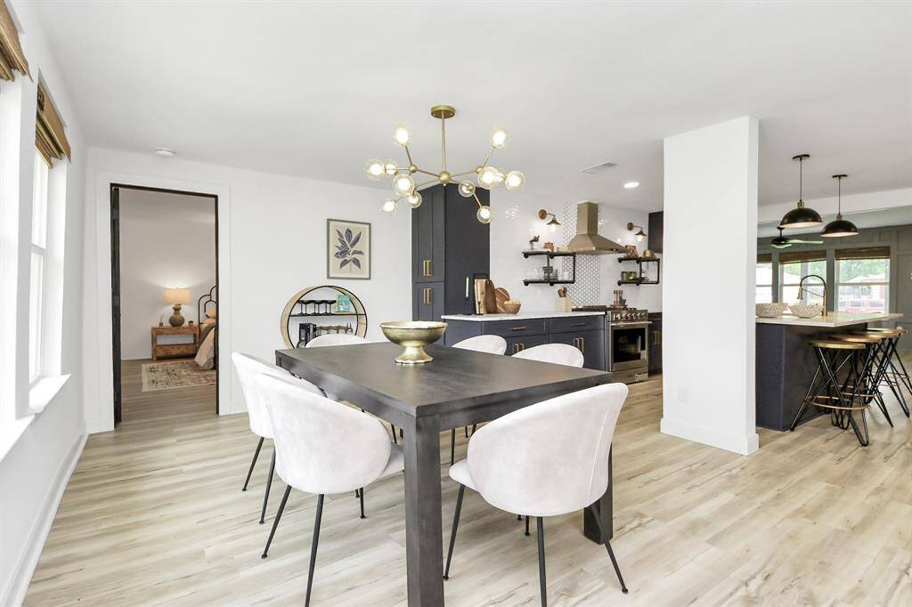 The dining room features windows with views in your backyardnext to the back door.