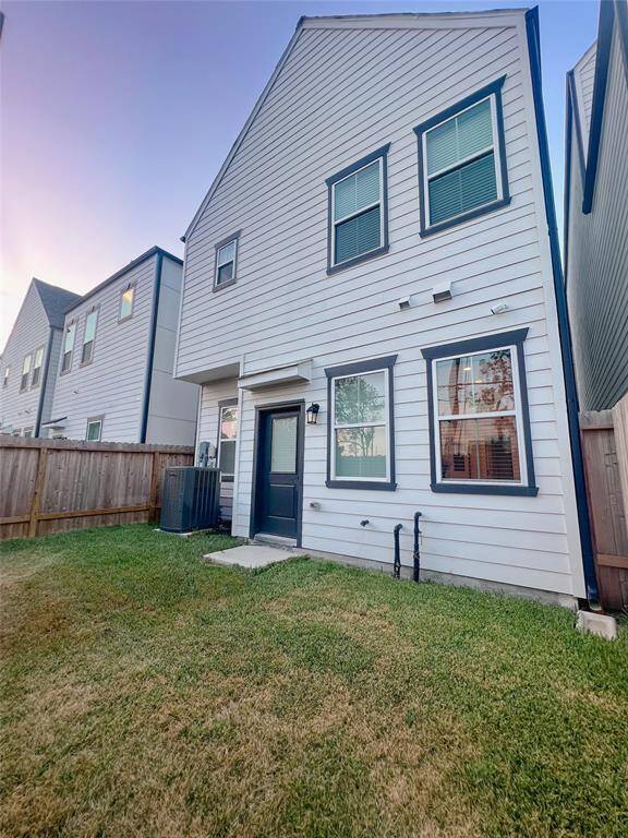 Backyard with access to the spacious dog run behind the fence. No back neighbors!