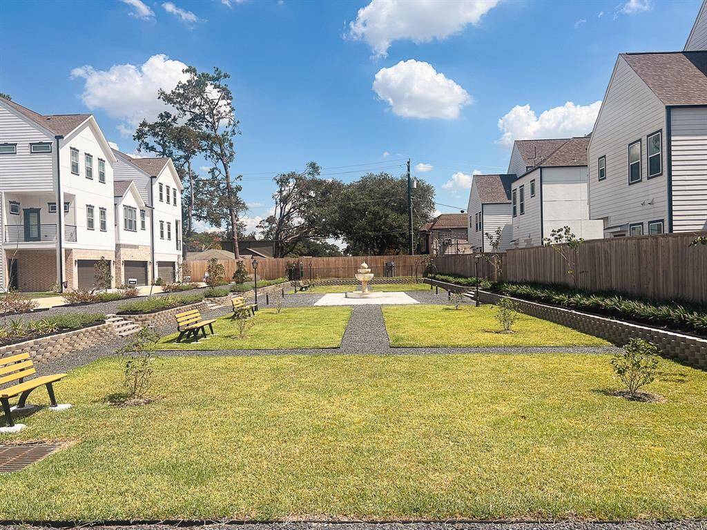 dog and community park and fountain on the opposite side