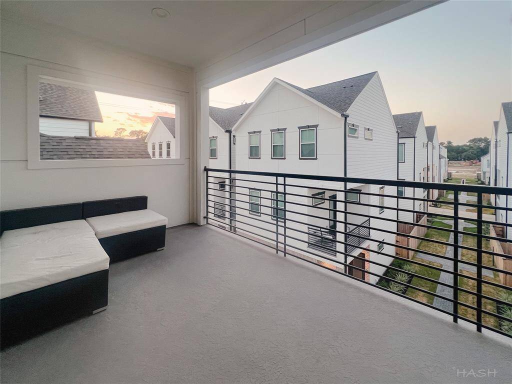 Balcony with no obstructed views and a view to the other side of the development and fountain courtyard (not pictured as this was taken prior to construction)
