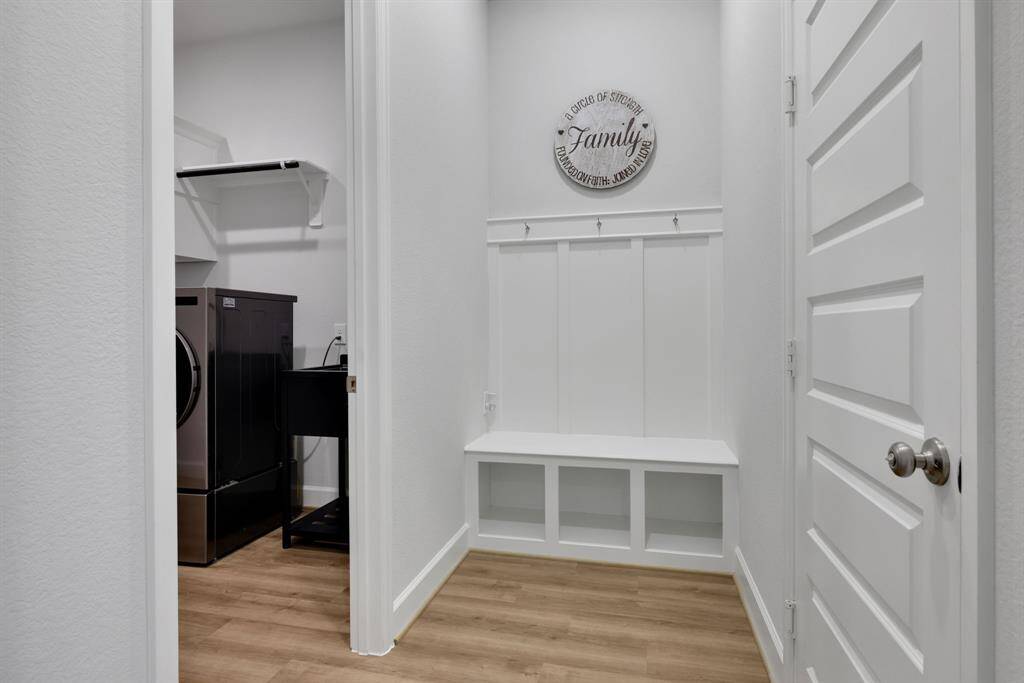 MUD room near entrance to the garage