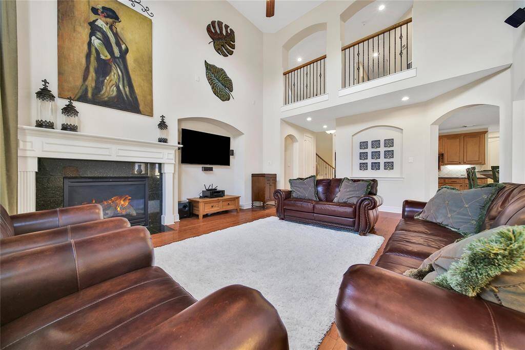 The gas log fireplace serves as a beautiful focal point, adding warmth and charm to the room.