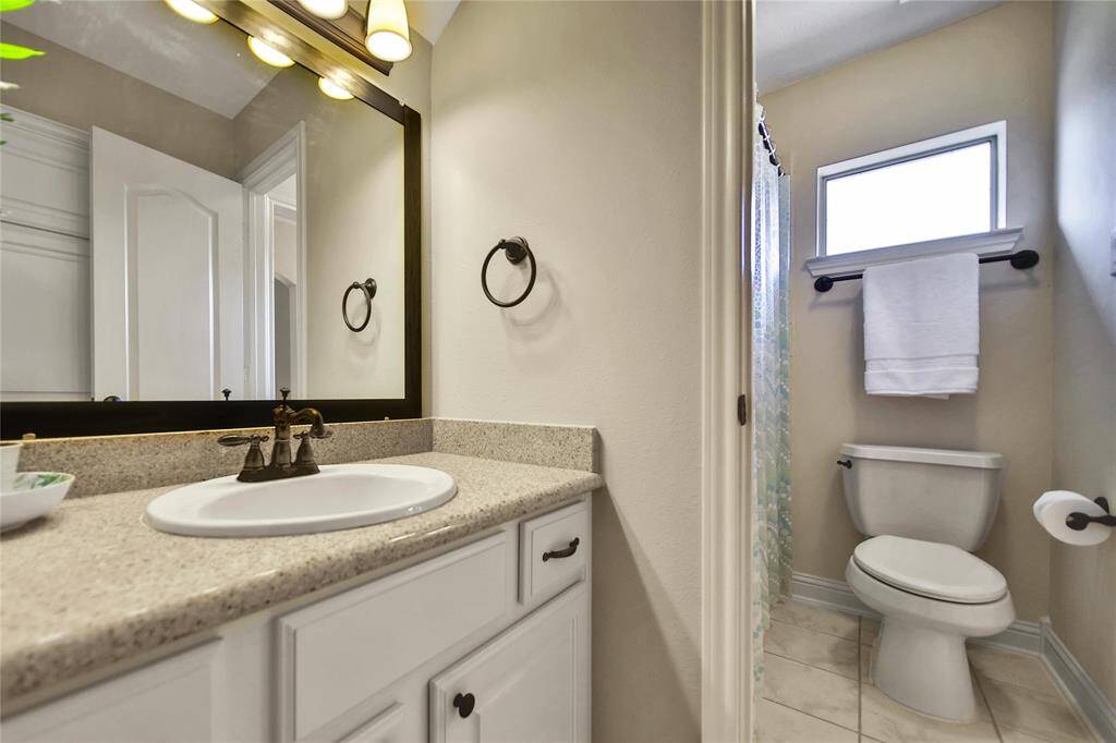 Private Vanity Area opens to connecting bathroom.