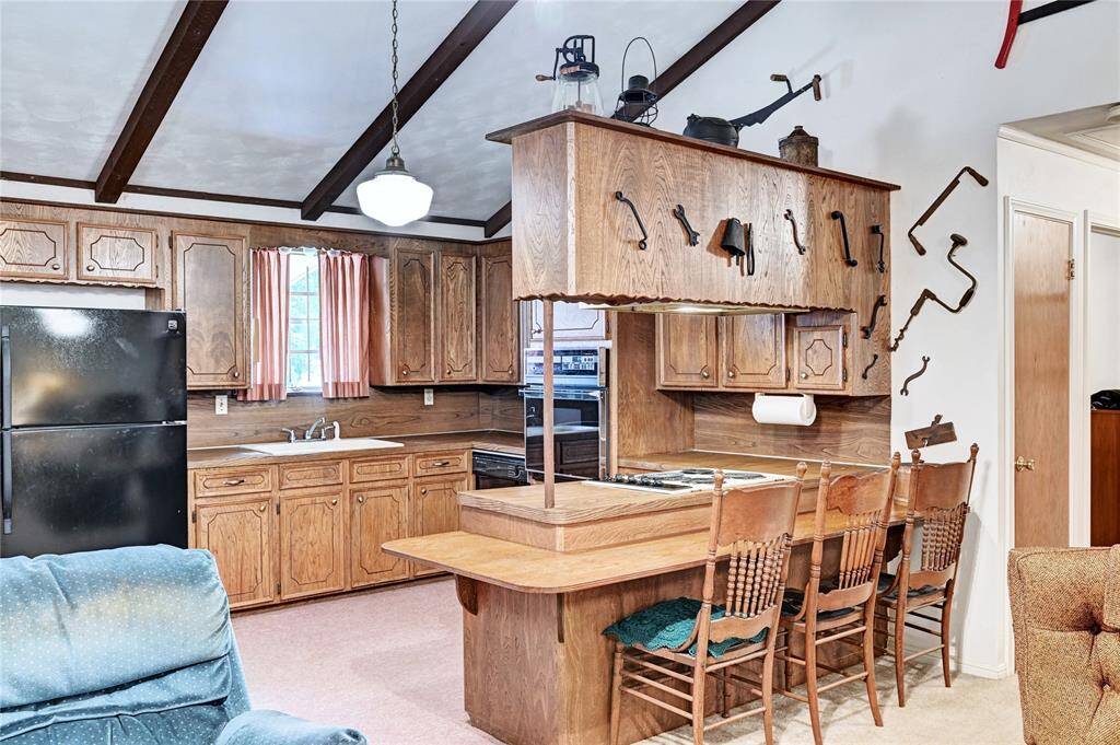 Lots of area for dining. You have the dining area to the left and the breakfast bar.