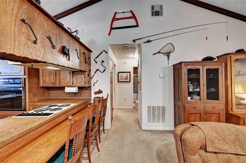 Down the hall are the bedrooms and bath