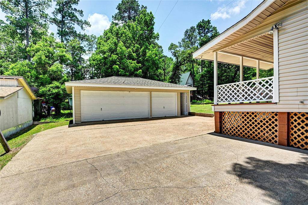30x20 3 bay garage. Covered patio just off the backdoor. It has a porch swing!!
