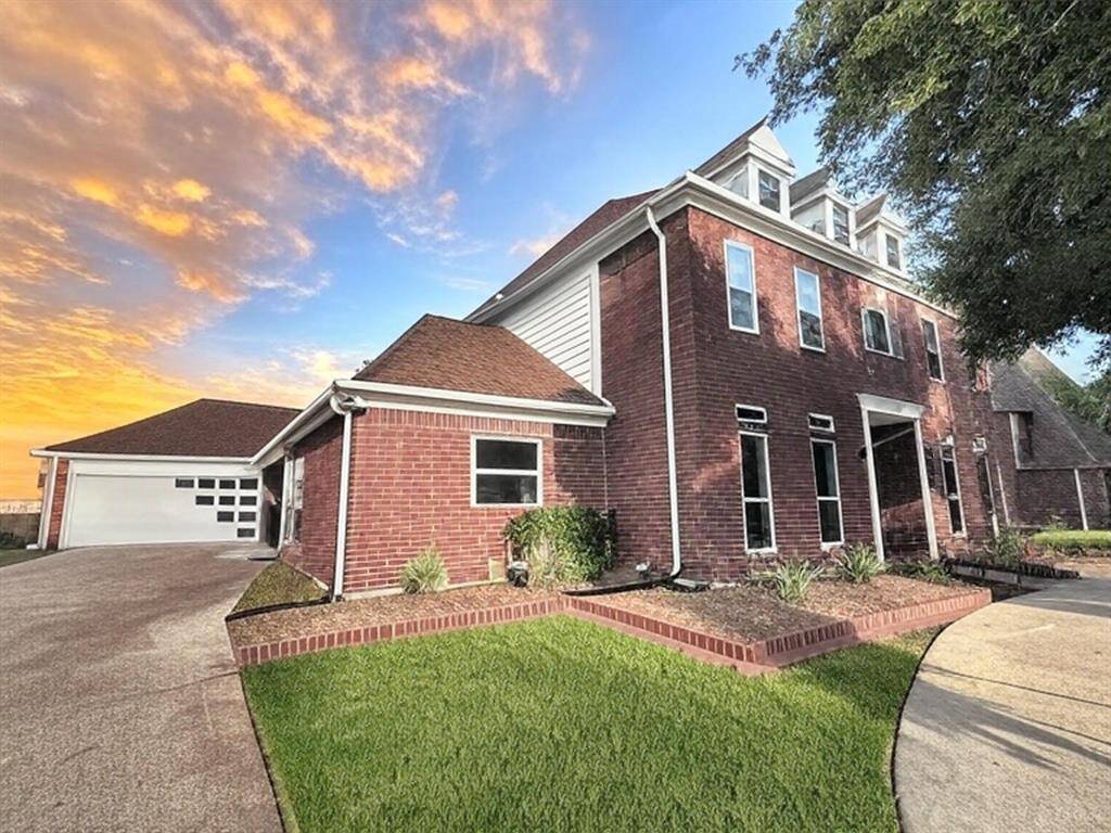 This home boasts approximately 3,100+ square feet, and has 4 bedrooms, 3.5 full baths and a large oversized garage (can house your golf cart or be a workshop space)! Photo enhanced.