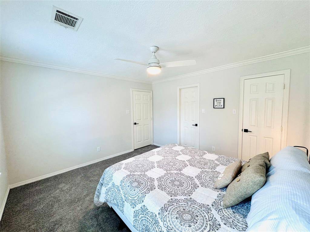 Another view of Bedroom Two, the walk in closet is to the right and the Jack & Jill Bath is through the door in the middle of the wall!