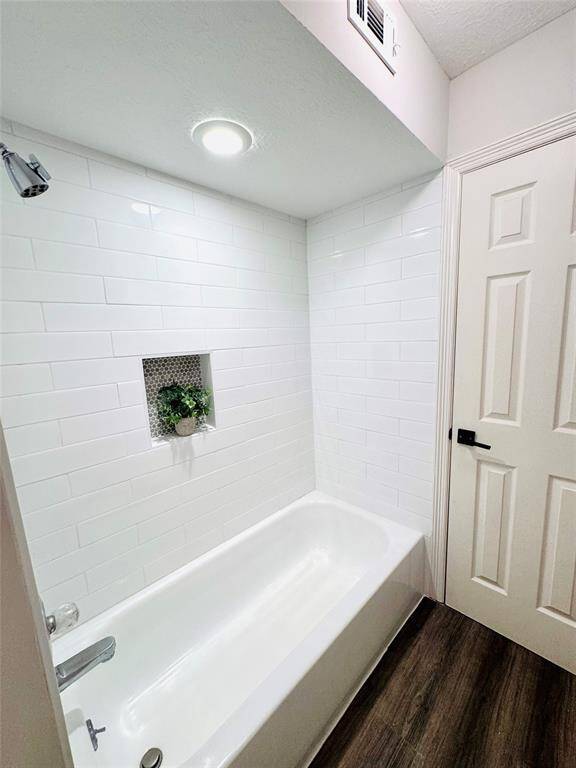 The tub/shower was updated with new subway tile!