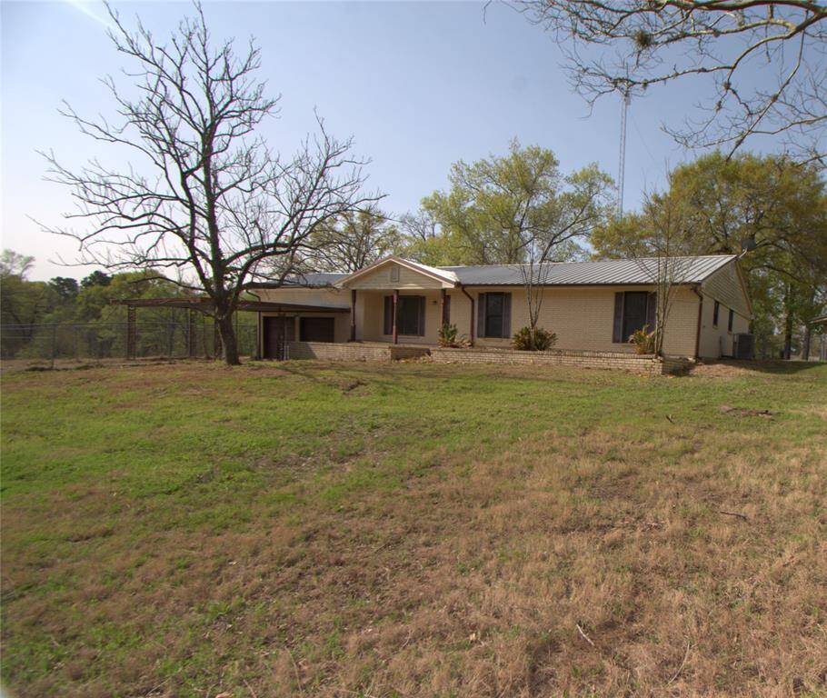 3 Bedroom, 2 Bathroom on 6 Lots. Covered Porch/Deck. Attached Garage and Car Port. Storage Shed.