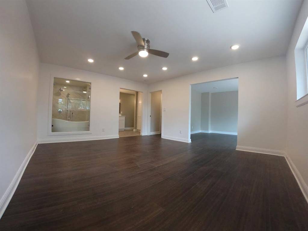 Master bedroom and bathroom and flex room. Master suite. Very European look.