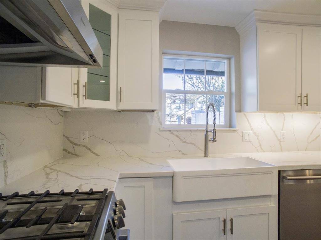 BOSCH gas range and hood and dishwasher and farmhouse sink. Also under cabinet lights. Just beautiful!
