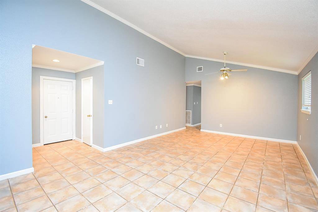 This home features pristine ceilings, elegantly painted walls, and beautifully crafted woodwork, creating a welcoming and stylish atmosphere.