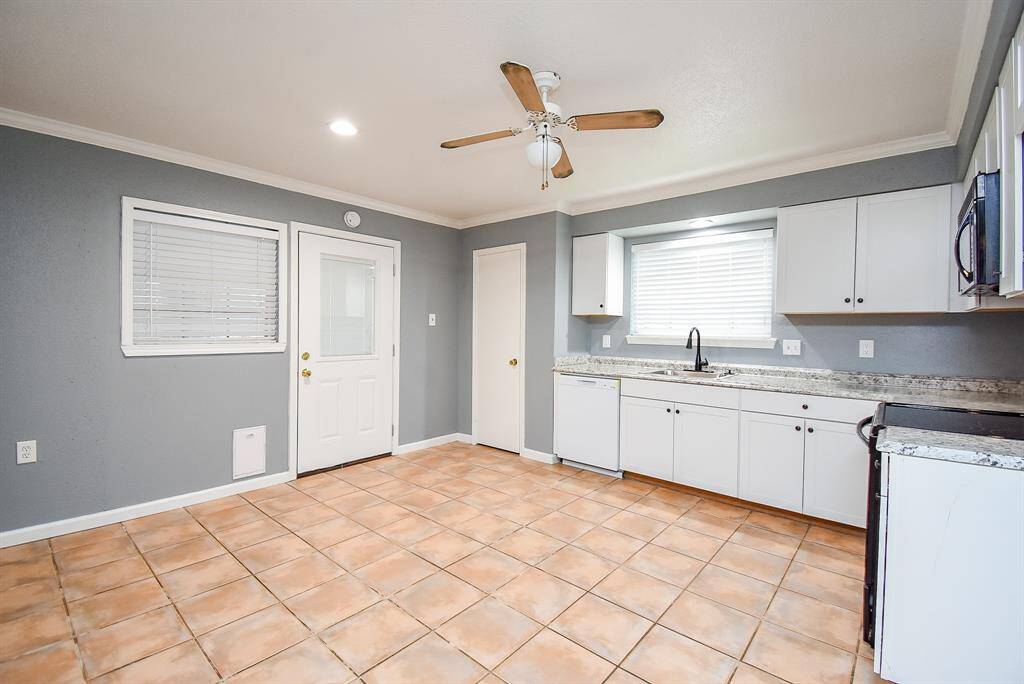 Enjoy modern convenience with a brand-new dishwasher, GFCI outlets, and a garbage disposal.
