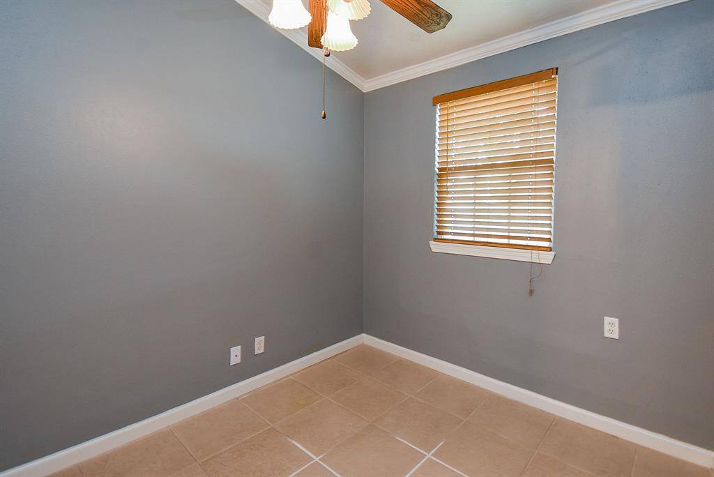 Cozy 9x9 space perfect for a studio or nursery.