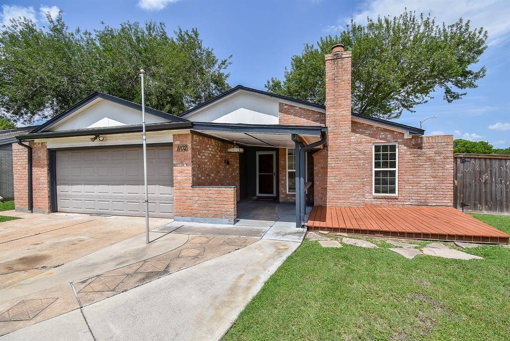 This charming home boasts modern upgrades, including a new roof, energy-efficient Low-E windows, and fresh interior and exterior paint.